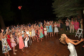 Night Wedding Bride Tossing Flowers Outdoors