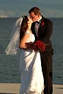 Wedding Couple Kissing Pier